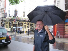 Owen. Rain. Museum Tavern behind.