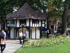 20110828-London-SohoSq-GardenersShedWithPigeons