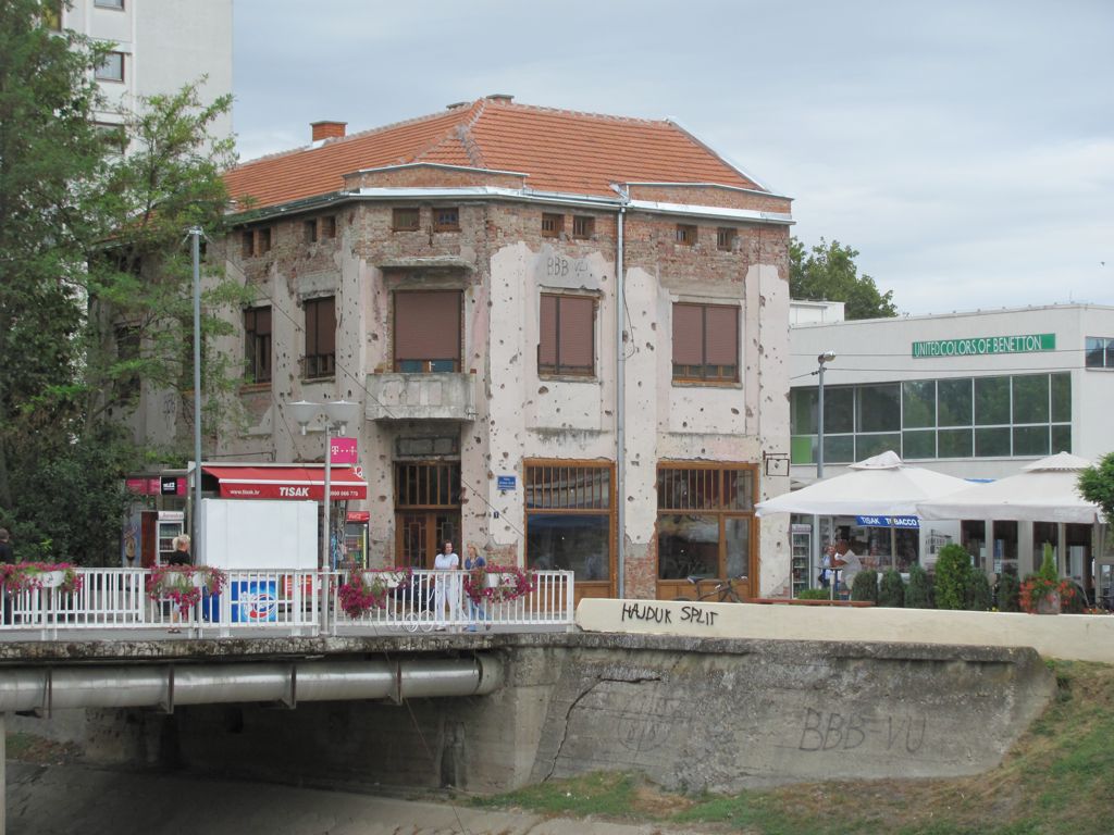 Building still shows bullet holes