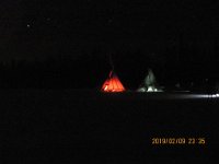 Teepees in pasture for warming